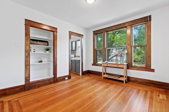 212 Maple St, New Haven, CT 06511 - empty room with light wood-type flooring and baseboards