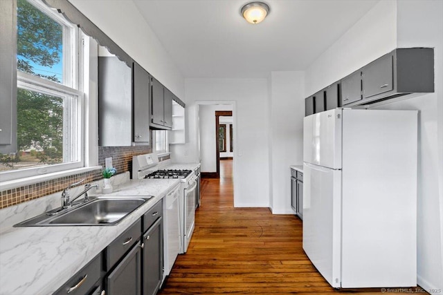 212 Maple St, New Haven, CT 06511 - kitchen featuring white appliances, dark wood-style flooring, light countertops, backsplash, and gray cabinetry