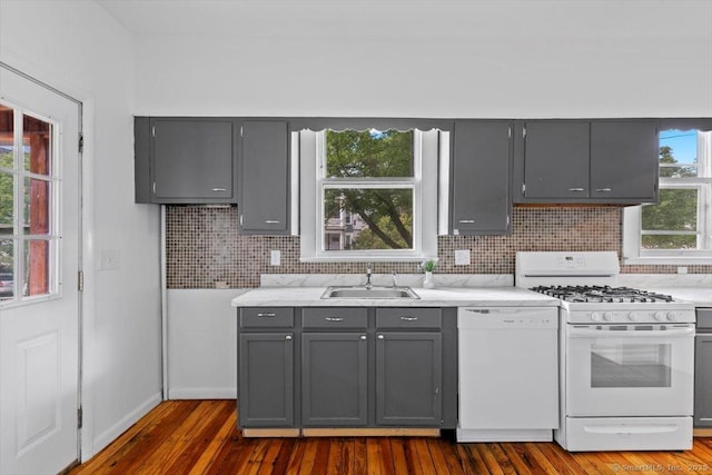 212 Maple St, New Haven, CT 06511 - kitchen with white appliances, gray cabinets, dark wood finished floors, backsplash, and light stone countertops