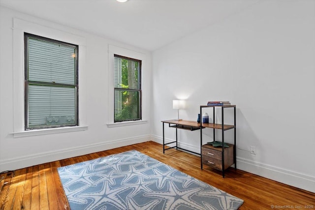 212 Maple St, New Haven, CT 06511 - living area with baseboards and wood finished floors