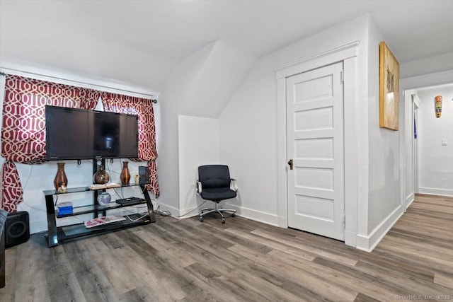 212 Maple St, New Haven, CT 06511 - sitting room with wood finished floors and vaulted ceiling
