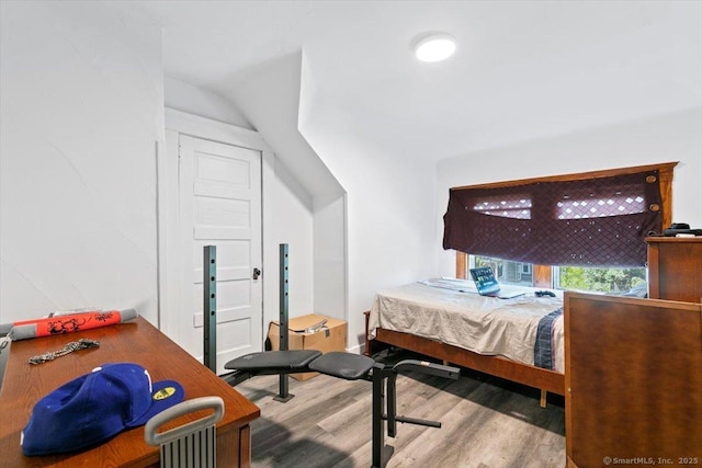 212 Maple St, New Haven, CT 06511 - bedroom with wood finished floors and vaulted ceiling