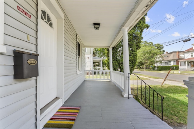 476 Washington Ave, West Haven, CT 06516 - covered porch featuring a lawn
