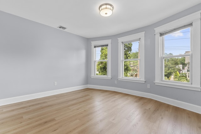 476 Washington Ave, West Haven, CT 06516 - empty room featuring light wood-style flooring and baseboards
