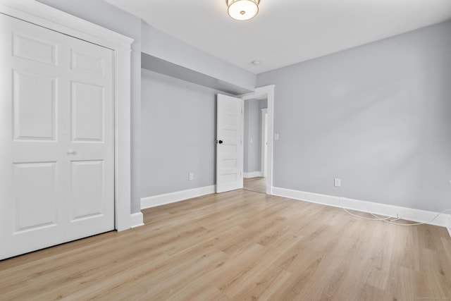 476 Washington Ave, West Haven, CT 06516 - unfurnished bedroom with light wood-type flooring and baseboards