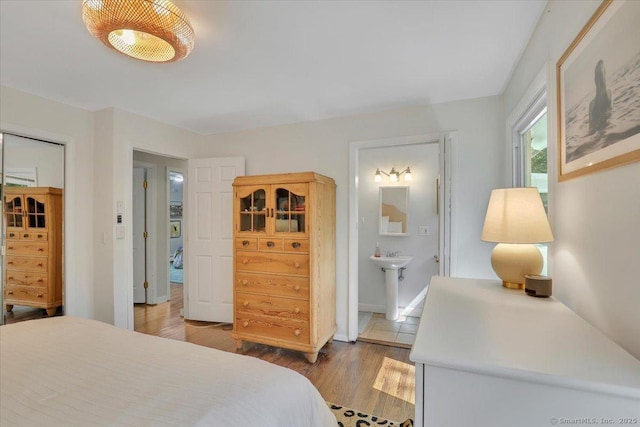 9 Madrina Ln, Madison, CT 06443 - bedroom featuring light wood-style floors and connected bathroom