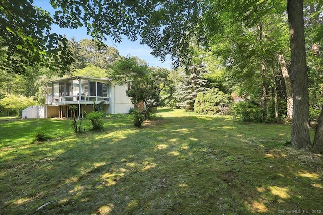 9 Madrina Ln, Madison, CT 06443 - view of grassy yard with a sunroom