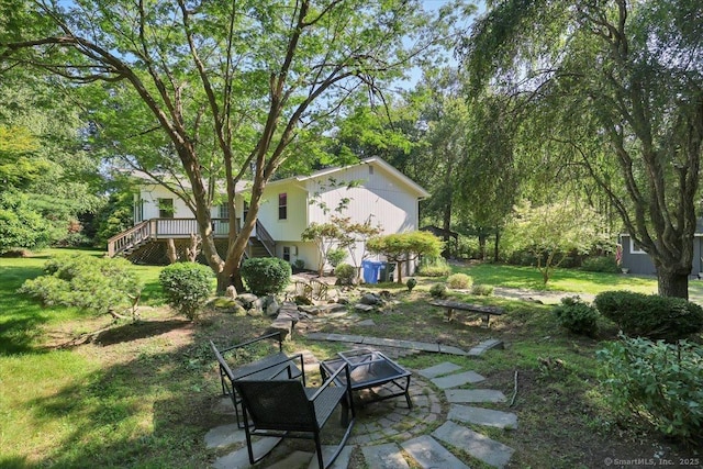 9 Madrina Ln, Madison, CT 06443 - view of green lawn featuring stairs, a patio area, and a wooden deck