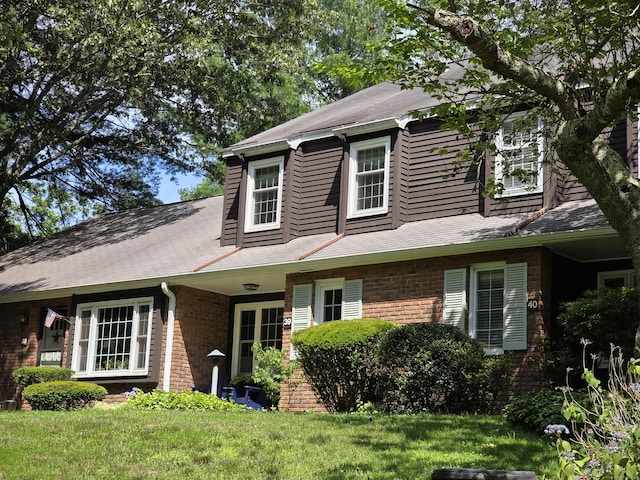 65 Main St Unit 39, Essex, CT 06442 - view of front of home featuring brick siding and a front lawn