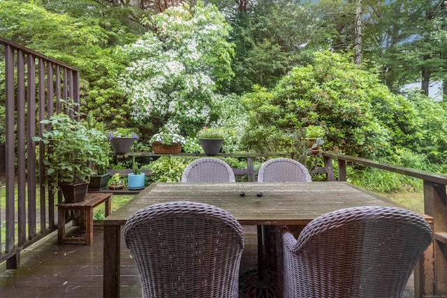 65 Main St Unit 39, Essex, CT 06442 - wooden terrace with outdoor dining space