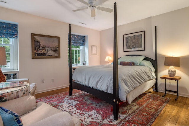 65 Main St Unit 39, Essex, CT 06442 - bedroom with multiple windows, wood finished floors, and a ceiling fan
