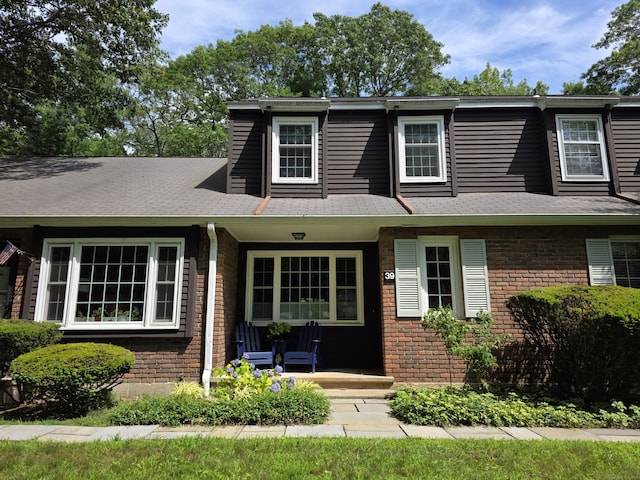 65 Main St Unit 39, Essex, CT 06442 - view of front of property featuring brick siding and a porch
