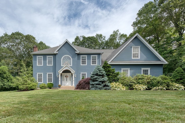 2 Warren Gln, Burlington, CT 06013 - colonial home featuring a chimney, a front lawn, and roof with shingles