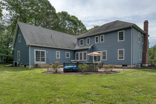 2 Warren Gln, Burlington, CT 06013 - back of property featuring entry steps, a chimney, a lawn, and roof with shingles