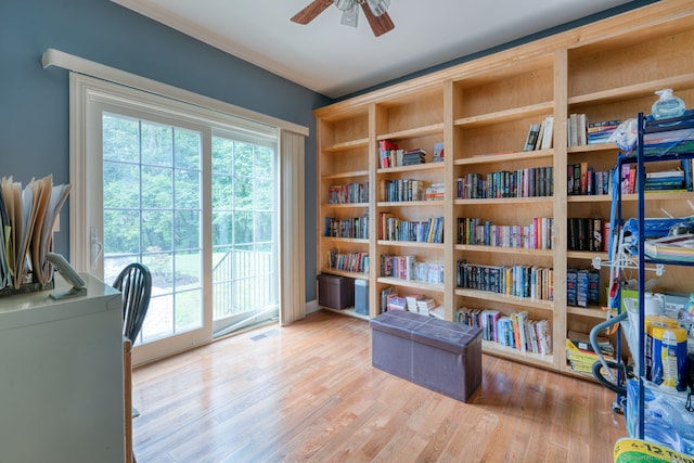 2 Warren Gln, Burlington, CT 06013 - living area with ceiling fan, healthy amount of natural light, and wood finished floors