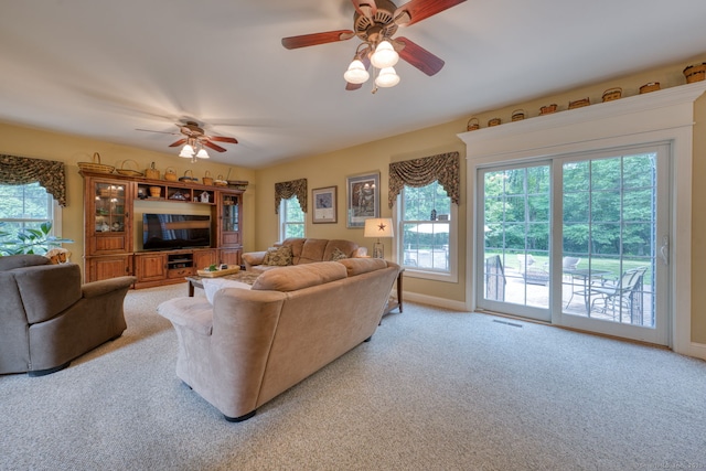 2 Warren Gln, Burlington, CT 06013 - living area with ceiling fan and light colored carpet