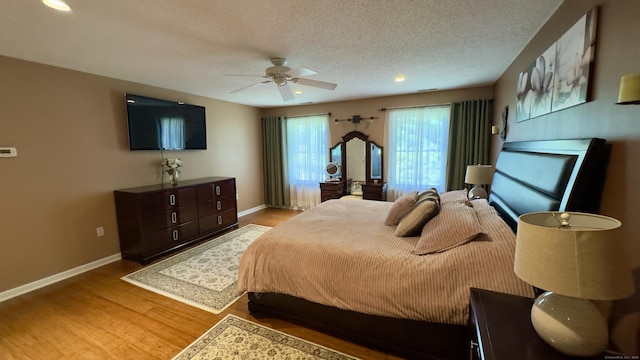 355 Oregon Rd, Cheshire, CT 06410 - bedroom featuring wood finished floors, recessed lighting, a ceiling fan, and a textured ceiling
