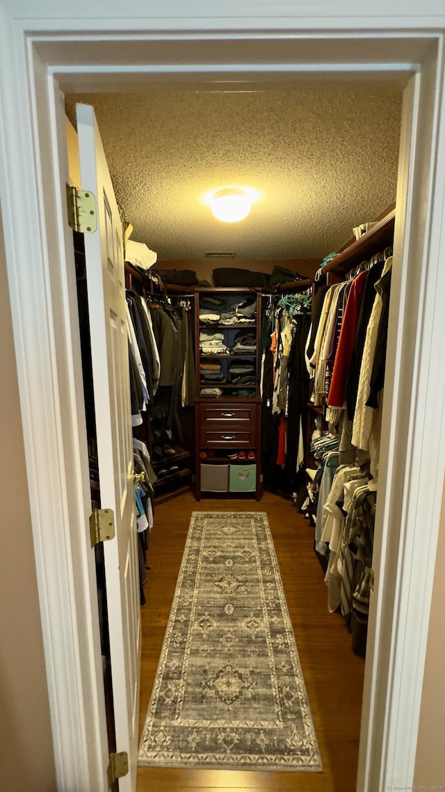 355 Oregon Rd, Cheshire, CT 06410 - spacious closet featuring dark wood-style floors