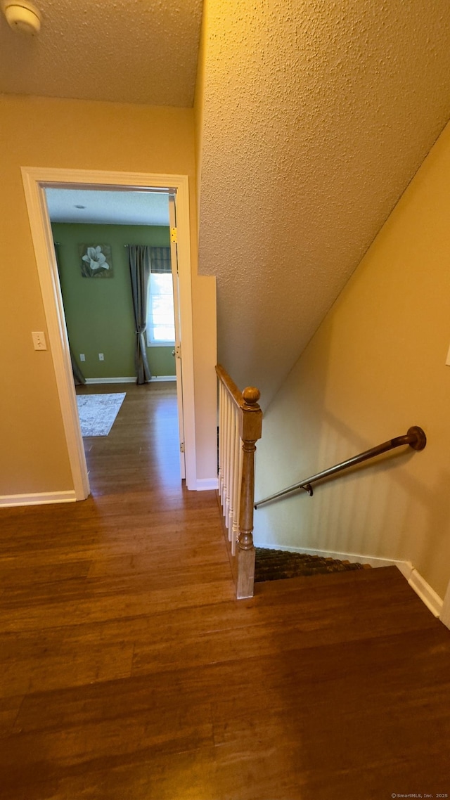 355 Oregon Rd, Cheshire, CT 06410 - staircase featuring wood finished floors and a textured ceiling