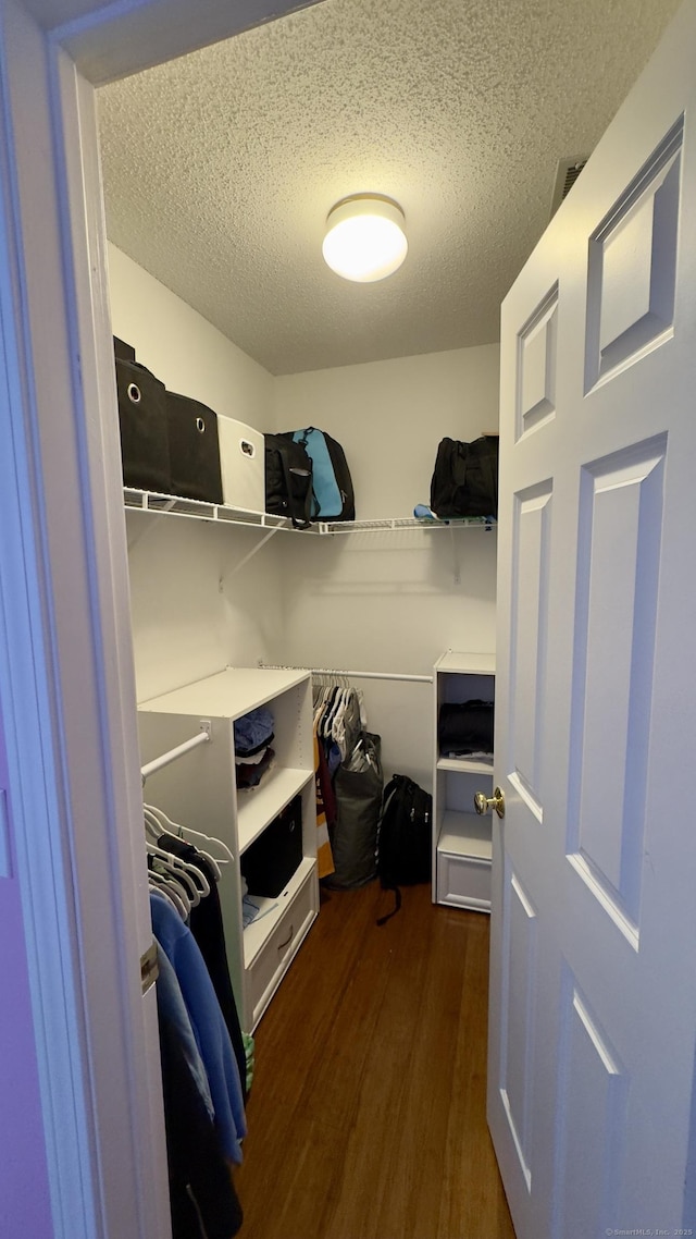355 Oregon Rd, Cheshire, CT 06410 - walk in closet featuring dark wood-style floors