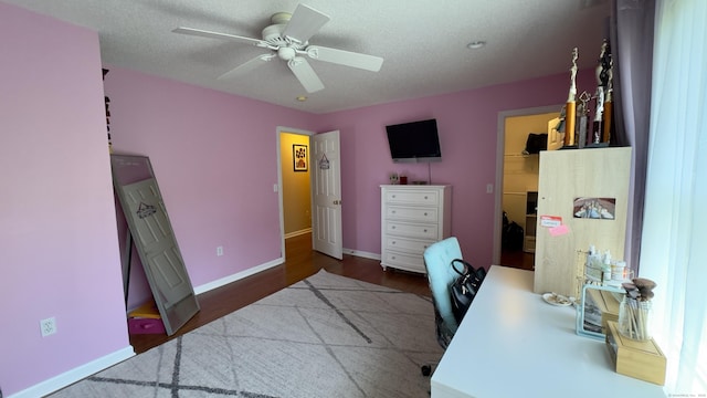 355 Oregon Rd, Cheshire, CT 06410 - home office featuring a ceiling fan, wood finished floors, and a textured ceiling