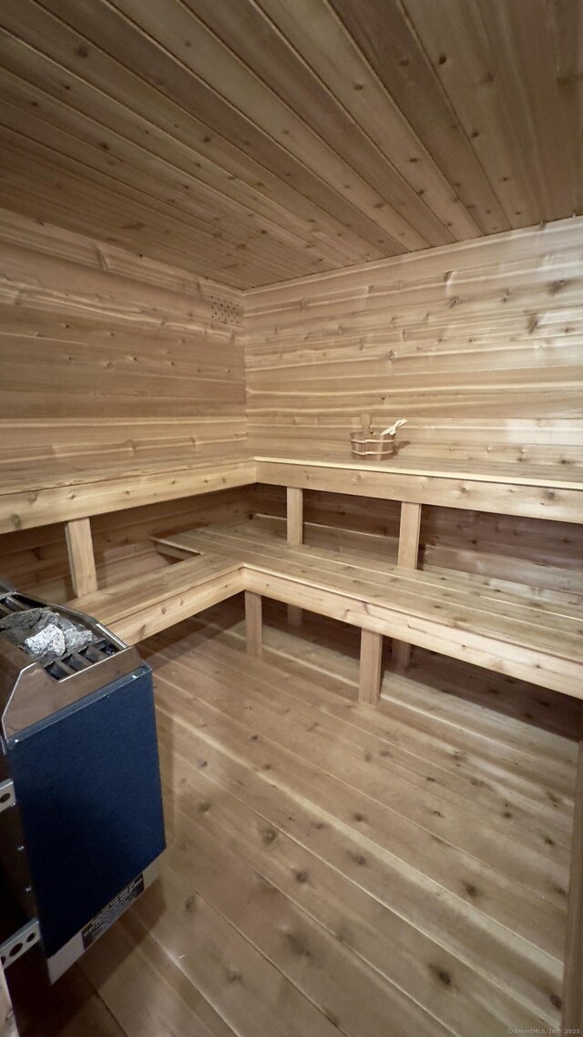 355 Oregon Rd, Cheshire, CT 06410 - relaxing sauna with wood ceiling, wooden walls, and hardwood / wood-style floors