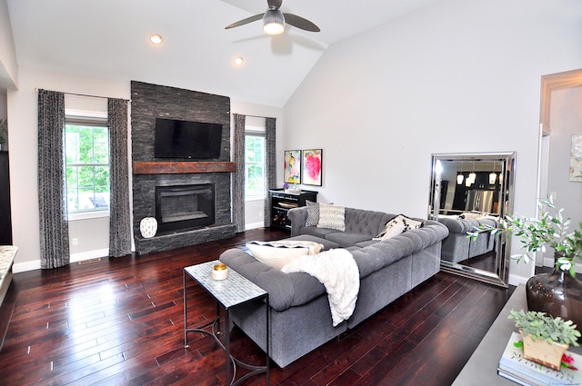419 Briarwood Dr, Manchester, CT 06040 - living area with ceiling fan, vaulted ceiling, hardwood / wood-style floors, a stone fireplace, and recessed lighting