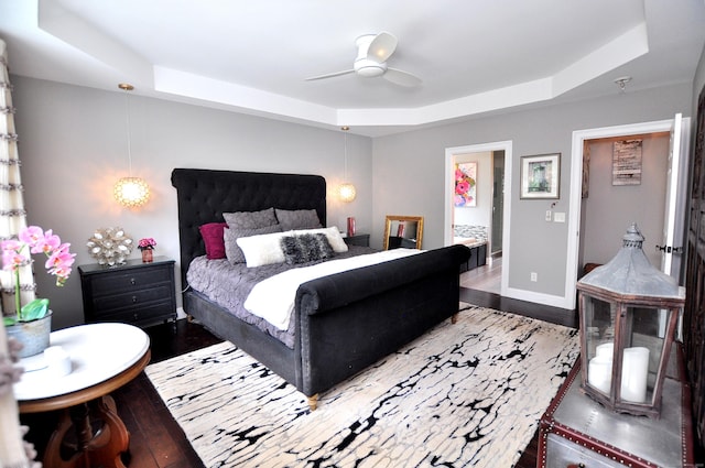419 Briarwood Dr, Manchester, CT 06040 - bedroom featuring a raised ceiling, wood finished floors, and ceiling fan