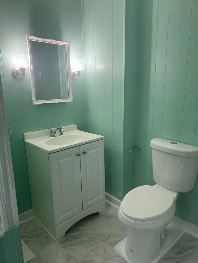 24 Daniel St, East Hartford, CT 06108 - half bath featuring marble finish flooring and vanity