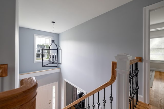11 Mariani Dr, Southington, CT 06489 - stairway with a chandelier, plenty of natural light, and wood finished floors