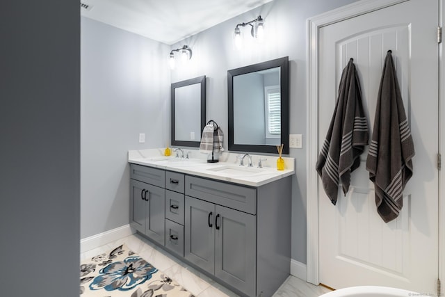 11 Mariani Dr, Southington, CT 06489 - bathroom featuring double vanity and marble finish floors
