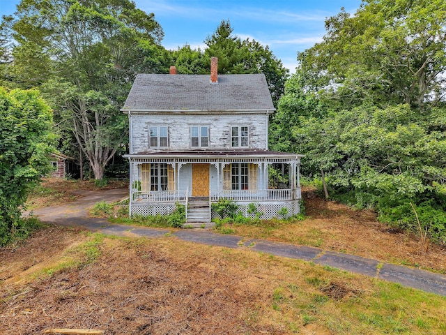 4 Bindloss Rd, Groton, CT 06355 - view of front of property featuring covered porch and a chimney