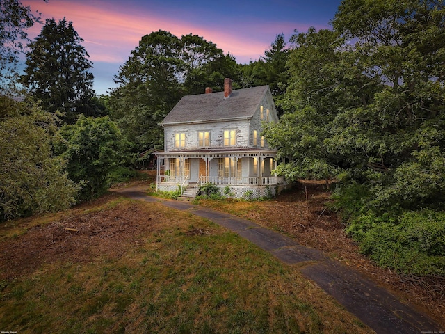 4 Bindloss Rd, Groton, CT 06355 - view of front of house featuring a porch, a chimney, and a lawn
