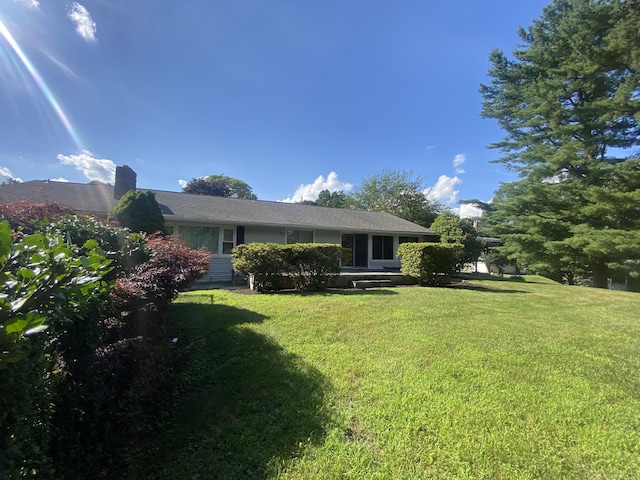 15 S Meadow Dr, Danbury, CT 06811 - back of house with a yard and a chimney