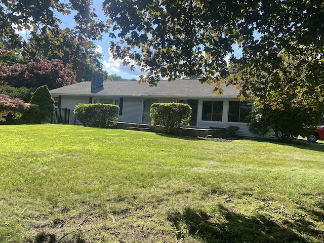 15 S Meadow Dr, Danbury, CT 06811 - ranch-style home featuring a front lawn and a chimney
