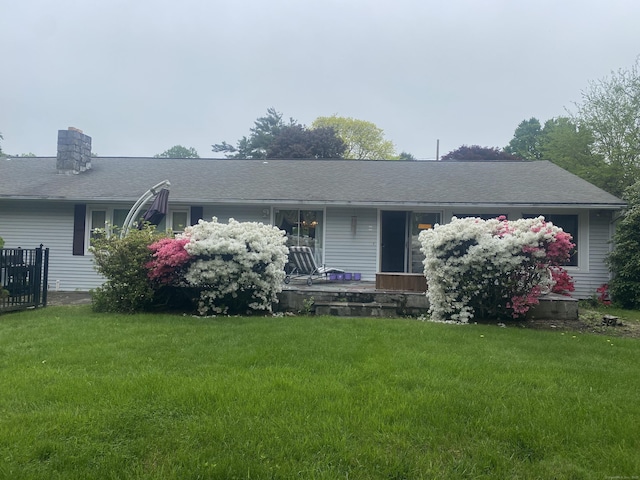 15 S Meadow Dr, Danbury, CT 06811 - ranch-style house with a front yard, covered porch, and a chimney