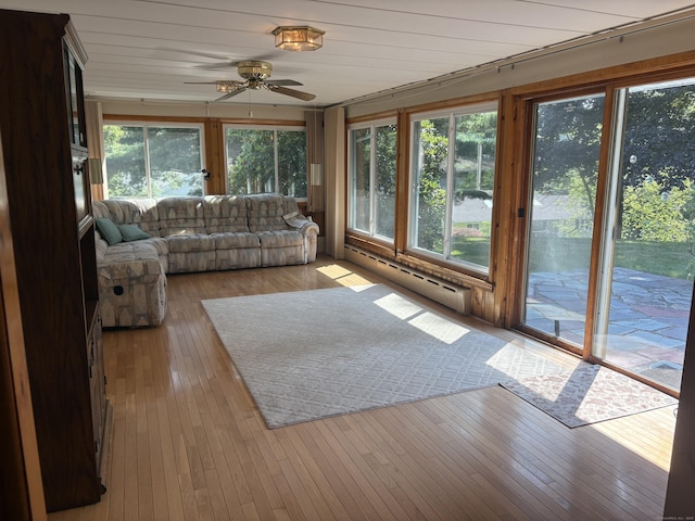 15 S Meadow Dr, Danbury, CT 06811 - sunroom / solarium with a baseboard heating unit and hardwood / wood-style flooring