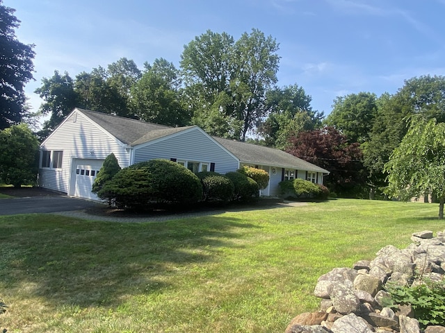 15 S Meadow Dr, Danbury, CT 06811 - view of front of property featuring driveway, a front lawn, and a garage
