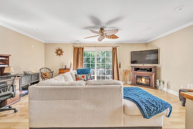 97 Ferry Ct Unit 97, Stratford, CT 06615 - living area with light wood finished floors, a ceiling fan, ornamental molding, a glass covered fireplace, and recessed lighting
