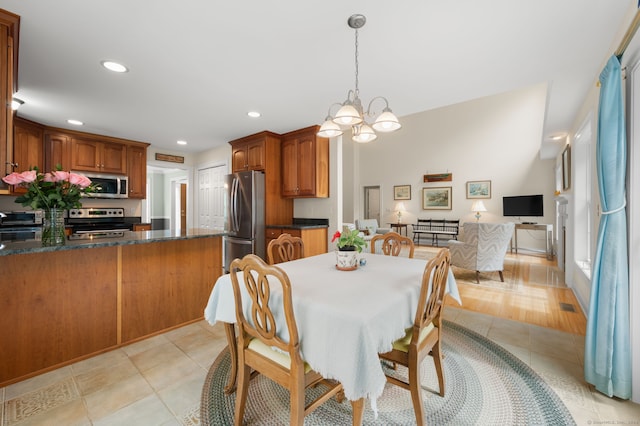 2 Spinnaker Dr Unit 2, East Lyme, CT 06357 - dining area with a chandelier, light tile patterned flooring, and recessed lighting