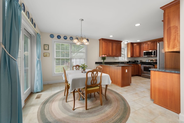 2 Spinnaker Dr Unit 2, East Lyme, CT 06357 - dining room featuring recessed lighting, a chandelier, and light tile patterned floors
