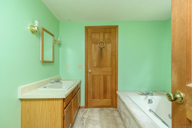 132 Wade Rd, Pomfret, CT 06259 - bathroom featuring vanity, a jetted tub, and a textured ceiling