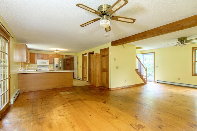 132 Wade Rd, Pomfret, CT 06259 - unfurnished living room with a baseboard heating unit, a textured ceiling, ceiling fan, light wood finished floors, and stairway