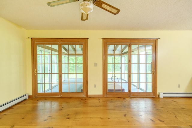 132 Wade Rd, Pomfret, CT 06259 - doorway with baseboard heating, healthy amount of natural light, and ceiling fan