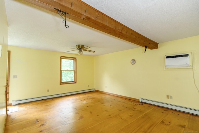 132 Wade Rd, Pomfret, CT 06259 - unfurnished room featuring a baseboard heating unit, light wood-style flooring, a ceiling fan, a wall mounted AC, and beam ceiling