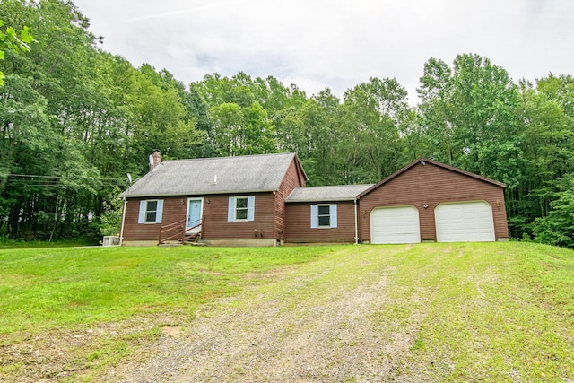 132 Wade Rd, Pomfret, CT 06259 - view of front of property featuring driveway, a chimney, a front lawn, a garage, and entry steps