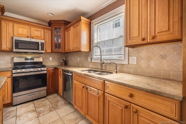 70 Albemarle St, Bridgeport, CT 06606 - kitchen featuring appliances with stainless steel finishes, brown cabinetry, light stone counters, tasteful backsplash, and crown molding