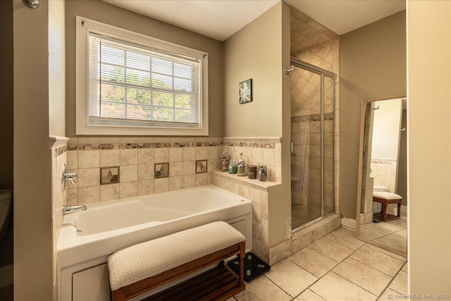 70 Albemarle St, Bridgeport, CT 06606 - bathroom featuring a shower stall, tile patterned flooring, and a bath