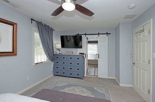 362 Main St, Meriden, CT 06451 - bedroom featuring light carpet, a barn door, and multiple windows
