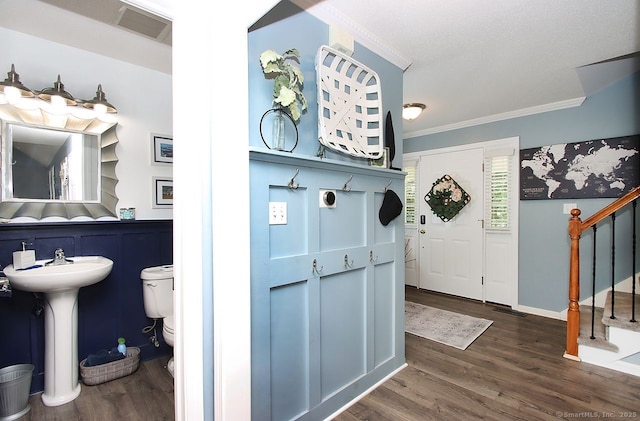 362 Main St, Meriden, CT 06451 - entryway featuring ornamental molding, wood finished floors, and stairs